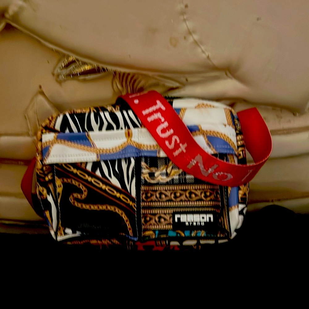 Purse, multicolor,Trust No One, adjustable red straps with logo,two zip  opening